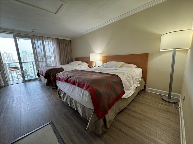 19201 Collins Ave Unit 1137, Sunny Isles Beach, FL 33160 - bedroom with access to exterior, wood finished floors, and ornamental molding