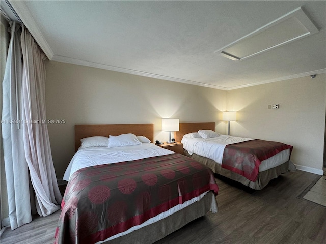 19201 Collins Ave Unit 1137, Sunny Isles Beach, FL 33160 - bedroom featuring attic access, wood finished floors, and ornamental molding