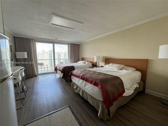 19201 Collins Ave Unit 1137, Sunny Isles Beach, FL 33160 - bedroom with attic access, access to outside, ornamental molding, wood finished floors, and a textured ceiling