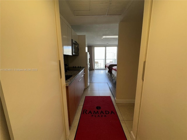 19201 Collins Ave Unit 1137, Sunny Isles Beach, FL 33160 - hall with light tile patterned flooring