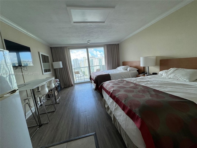 19201 Collins Ave Unit 1137, Sunny Isles Beach, FL 33160 - bedroom with attic access, access to outside, wood finished floors, ornamental molding, and freestanding refrigerator