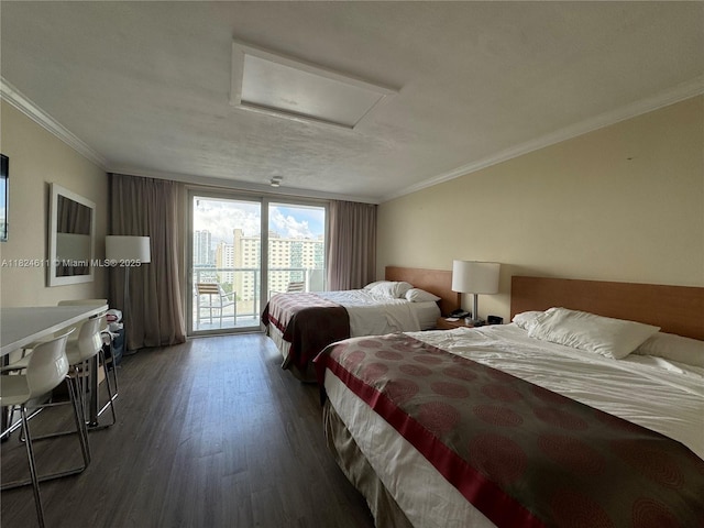 19201 Collins Ave Unit 1137, Sunny Isles Beach, FL 33160 - bedroom with attic access, wood finished floors, access to exterior, and ornamental molding