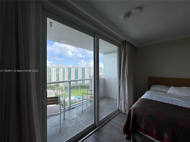 19201 Collins Ave Unit 1137, Sunny Isles Beach, FL 33160 - bedroom with dark wood-style floors and a city view