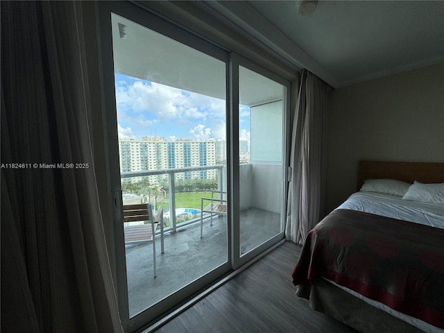 19201 Collins Ave Unit 1137, Sunny Isles Beach, FL 33160 - bedroom featuring dark wood-type flooring and a view of city