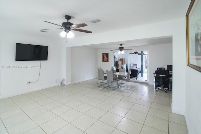 6459 Evans St, Hollywood, FL 33024 - living area with ceiling fan, a desk, and light tile patterned flooring
