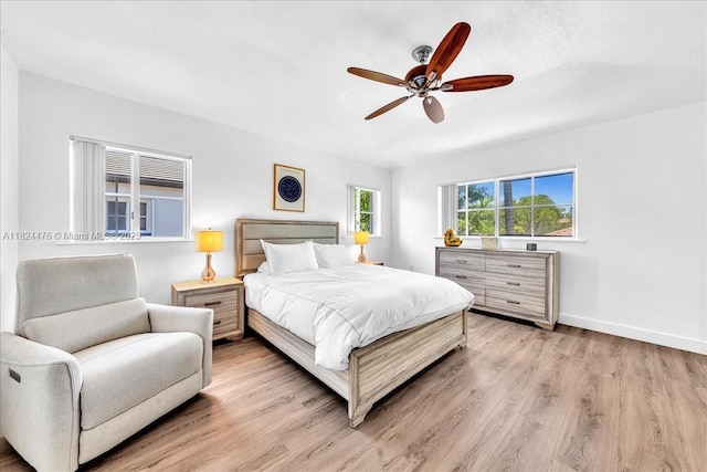 12926 SW 50th St, Miramar, FL 33027 - bedroom with light wood-type flooring and ceiling fan