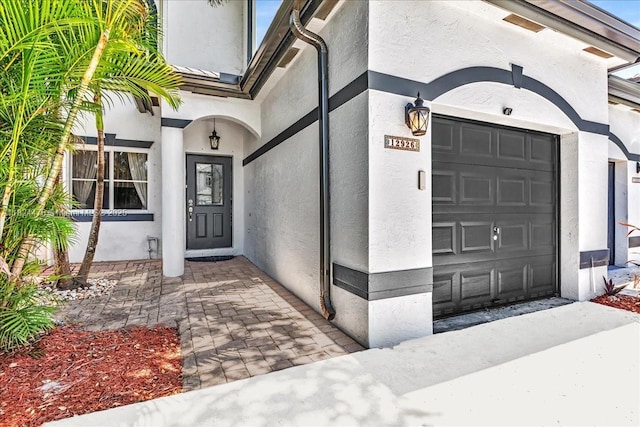 12926 SW 50th St, Miramar, FL 33027 - doorway to property featuring stucco siding