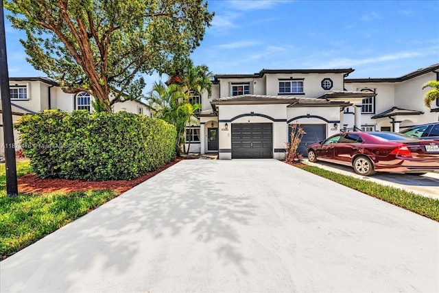 12926 SW 50th St, Miramar, FL 33027 - mediterranean / spanish home featuring stucco siding, driveway, and an attached garage