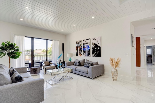 8965 NW 174th Ln, Hialeah, FL 33018 - living area featuring light marble finish flooring, recessed lighting, and wood ceiling