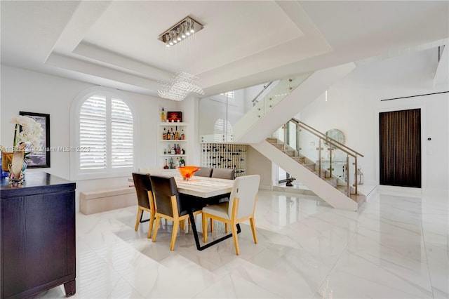 8965 NW 174th Ln, Hialeah, FL 33018 - dining area featuring stairs, marble tiled flooring, and a tray ceiling