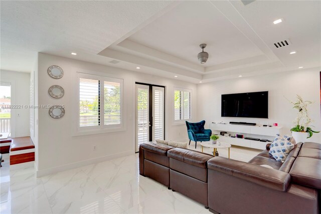 8965 NW 174th Ln, Hialeah, FL 33018 - living area with a tray ceiling, light marble finish flooring, and recessed lighting