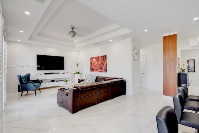8965 NW 174th Ln, Hialeah, FL 33018 - living room featuring a raised ceiling, light marble finish floors, and recessed lighting