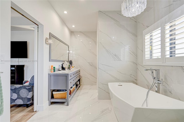 8965 NW 174th Ln, Hialeah, FL 33018 - full bath with a freestanding bath, vanity, recessed lighting, ensuite bathroom, and a chandelier