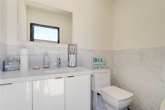 8965 NW 174th Ln, Hialeah, FL 33018 - half bath featuring tile walls, vanity, and tasteful backsplash