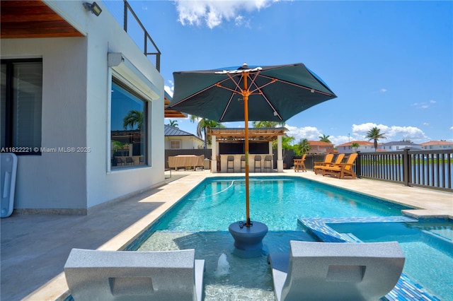 8965 NW 174th Ln, Hialeah, FL 33018 - view of swimming pool with a patio and a pool with connected hot tub