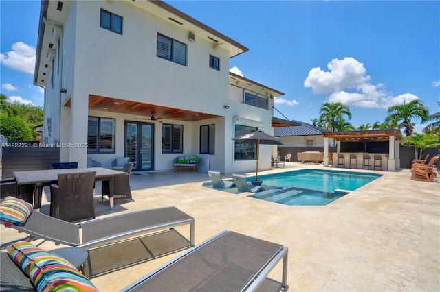 8965 NW 174th Ln, Hialeah, FL 33018 - view of pool with a patio area, french doors, and a pool with connected hot tub