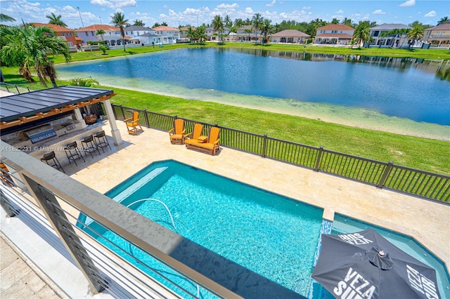 8965 NW 174th Ln, Hialeah, FL 33018 - view of swimming pool featuring a water view, a patio area, and a residential view