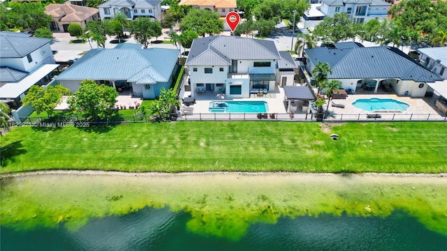 8965 NW 174th Ln, Hialeah, FL 33018 - aerial perspective of suburban area featuring a pool area and a large body of water