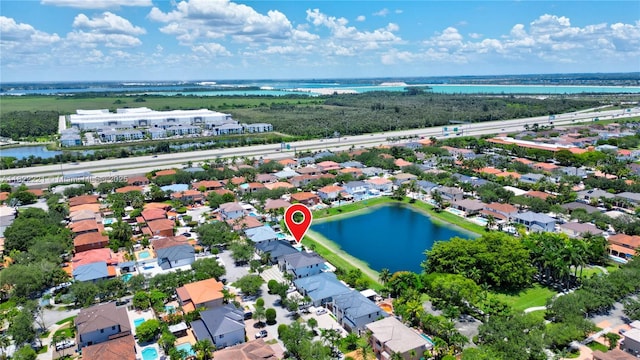8965 NW 174th Ln, Hialeah, FL 33018 - aerial perspective of suburban area featuring a large body of water