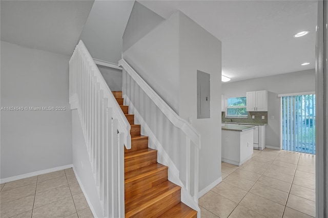 2903 SE 15th Ter, Homestead, FL 33035 - stairway with electric panel, tile patterned floors, and recessed lighting
