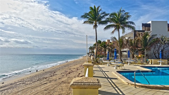 3475 S Ocean Blvd Unit 611, Palm Beach, FL 33480 - community pool featuring view of water and beach and a patio