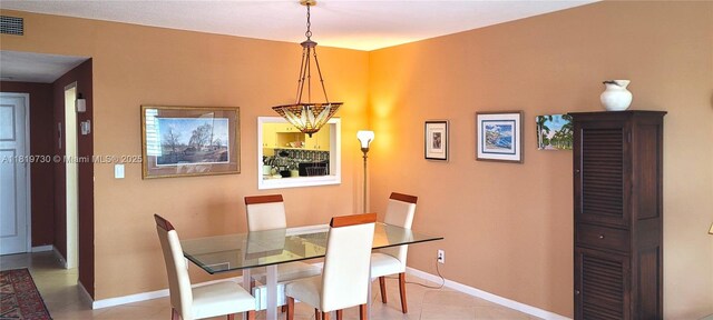 3475 S Ocean Blvd Unit 611, Palm Beach, FL 33480 - dining room featuring baseboards and tile patterned floors