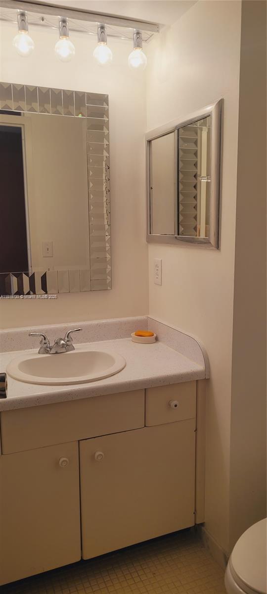 3475 S Ocean Blvd Unit 611, Palm Beach, FL 33480 - bathroom featuring vanity and toilet