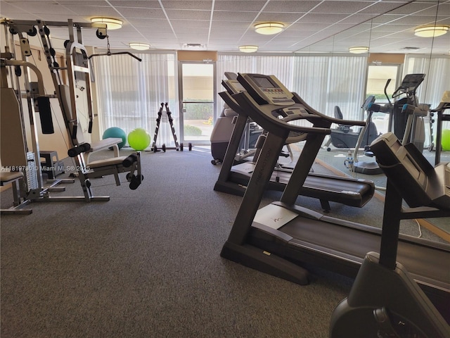 3475 S Ocean Blvd Unit 611, Palm Beach, FL 33480 - workout area featuring a drop ceiling, a wall of windows, and carpet floors
