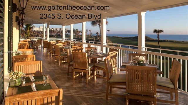 3475 S Ocean Blvd Unit 611, Palm Beach, FL 33480 - wooden terrace with a water view and outdoor dining area