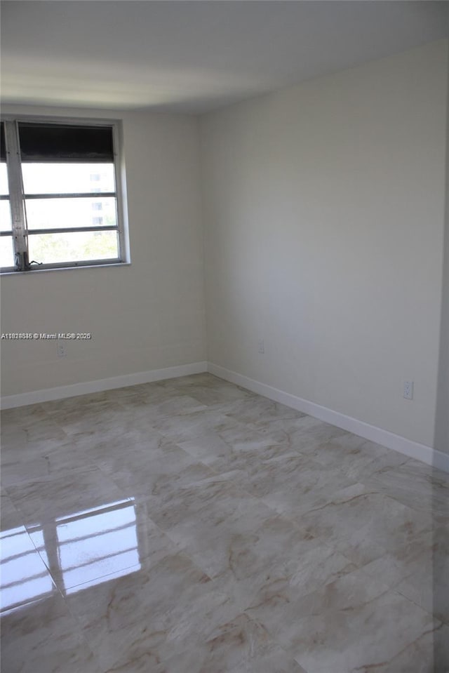 2930 Point E Dr Unit E309, Aventura, FL 33160 - empty room featuring baseboards