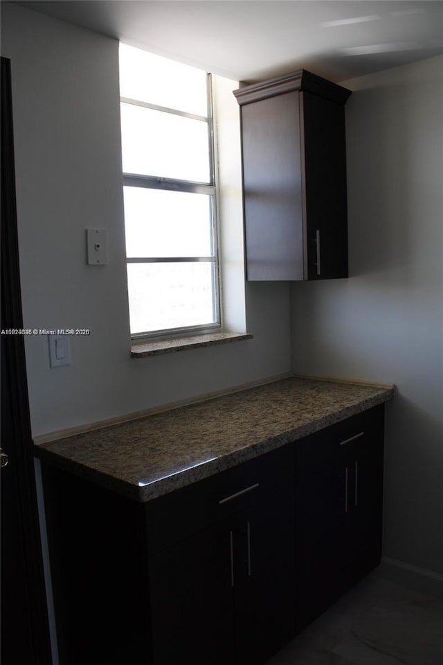 2930 Point E Dr Unit E309, Aventura, FL 33160 - kitchen featuring dark countertops