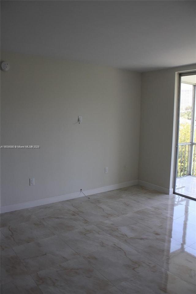 2930 Point E Dr Unit E309, Aventura, FL 33160 - unfurnished room with baseboards and a smoke detector