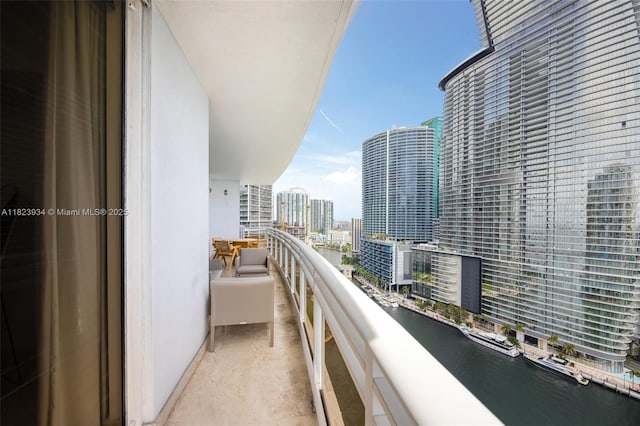 901 Brickell Key Blvd Unit 2506, Miami, FL 33131 - balcony featuring a city view and a water view