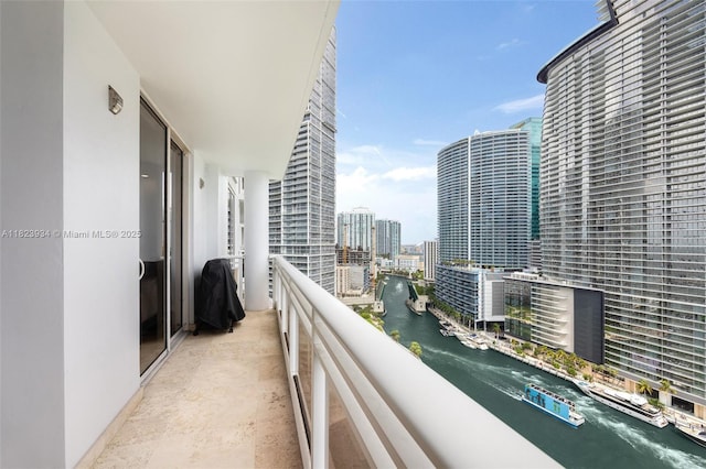 901 Brickell Key Blvd Unit 2506, Miami, FL 33131 - balcony with a water view and a view of city