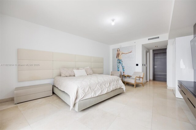 901 Brickell Key Blvd Unit 2506, Miami, FL 33131 - bedroom featuring light tile patterned floors