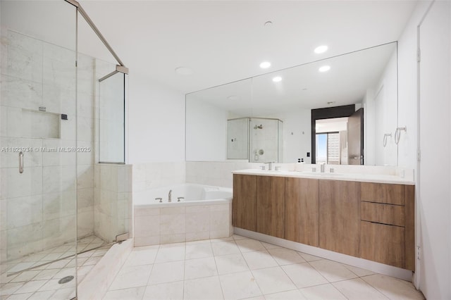 901 Brickell Key Blvd Unit 2506, Miami, FL 33131 - bathroom with a garden tub, a stall shower, double vanity, recessed lighting, and tile patterned floors