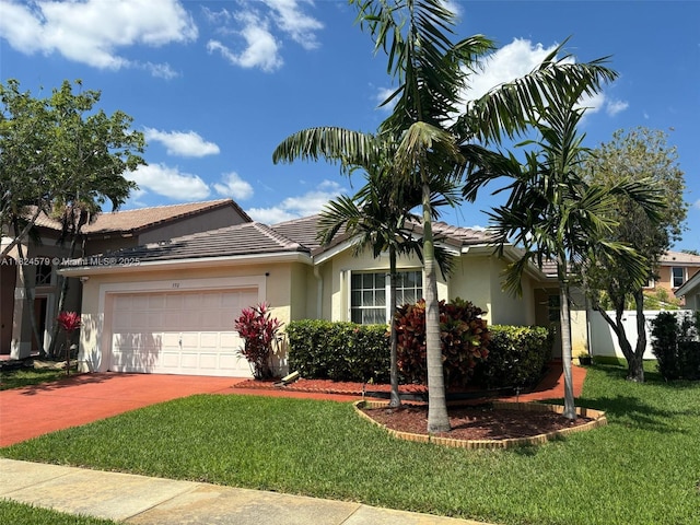 530 SW 182nd Way, Pembroke Pines, FL 33029 - single story home featuring stucco siding, an attached garage, and a front lawn