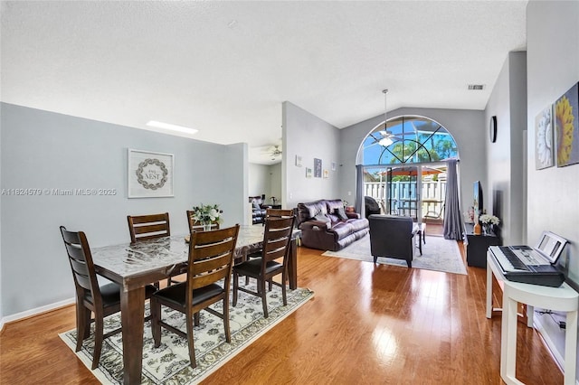 530 SW 182nd Way, Pembroke Pines, FL 33029 - dining room with wood finished floors and lofted ceiling