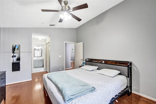 530 SW 182nd Way, Pembroke Pines, FL 33029 - bedroom with lofted ceiling, dark wood-style floors, ensuite bath, and ceiling fan
