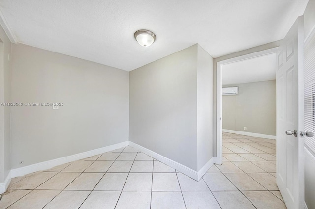 4625 SW 32nd Dr, West Park, FL 33023 - spare room with a wall mounted air conditioner and light tile patterned flooring