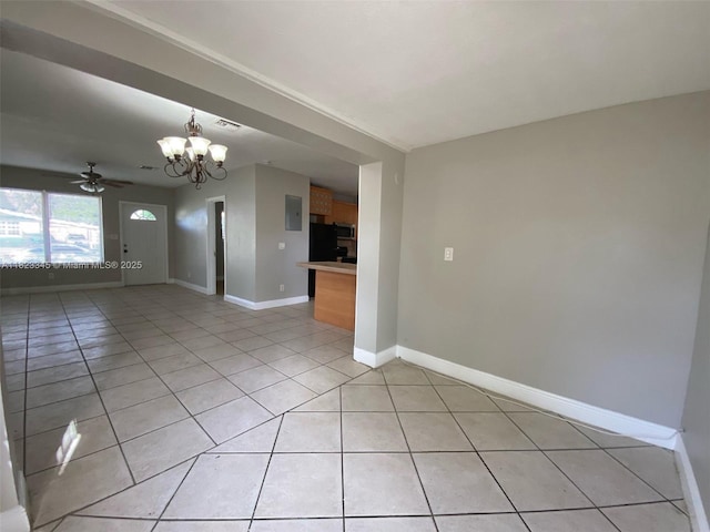 4625 SW 32nd Dr, West Park, FL 33023 - spare room with light tile patterned flooring, a chandelier, a ceiling fan, and electric panel