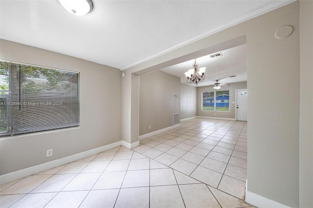 4625 SW 32nd Dr, West Park, FL 33023 - unfurnished room featuring a chandelier and light tile patterned flooring