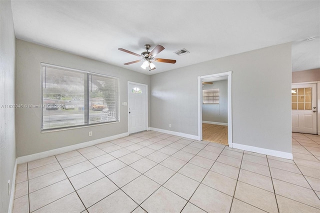 4625 SW 32nd Dr, West Park, FL 33023 - unfurnished bedroom featuring multiple windows, light tile patterned floors, and a ceiling fan