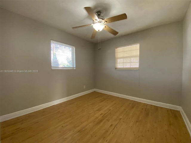 4625 SW 32nd Dr, West Park, FL 33023 - unfurnished room with plenty of natural light, light wood finished floors, and a ceiling fan