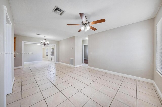 4625 SW 32nd Dr, West Park, FL 33023 - empty room featuring a chandelier, ceiling fan, and light tile patterned floors