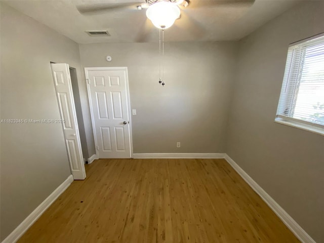 4625 SW 32nd Dr, West Park, FL 33023 - empty room with ceiling fan and light wood-style flooring