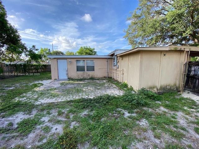 4625 SW 32nd Dr, West Park, FL 33023 - back of property featuring a fenced backyard and a patio area