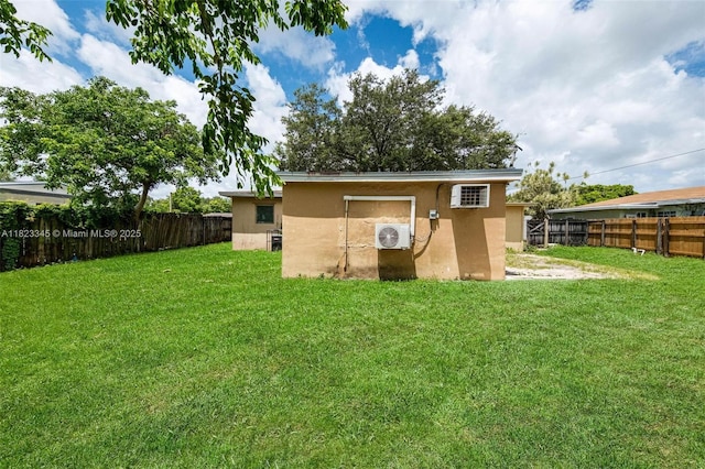 4625 SW 32nd Dr, West Park, FL 33023 - view of outbuilding with a fenced backyard and a wall mounted AC