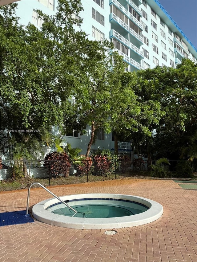 4001 Hillcrest Dr Unit 710, Hollywood, FL 33021 - view of swimming pool featuring a community hot tub