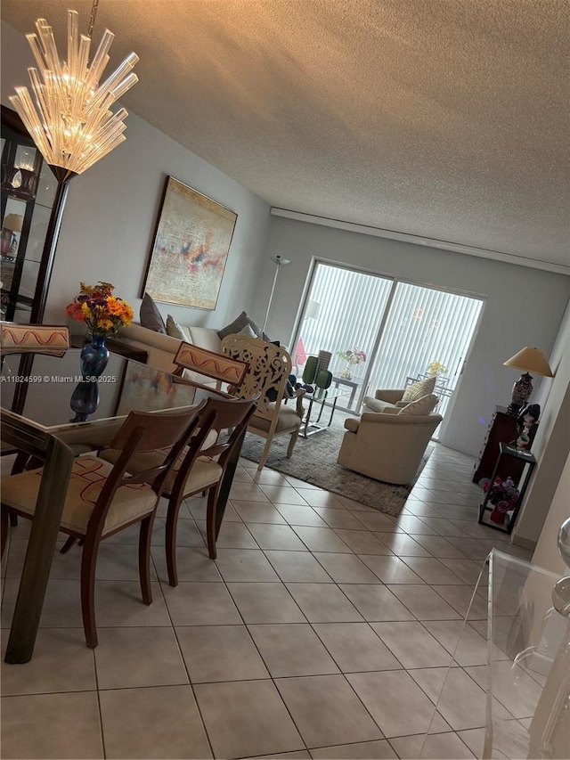 4001 Hillcrest Dr Unit 710, Hollywood, FL 33021 - dining area with a textured ceiling, a chandelier, and light tile patterned flooring